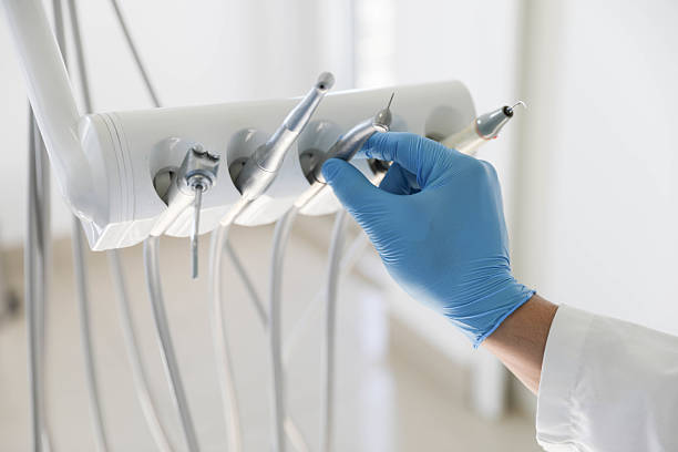 Professional Tooth Extraction technician working in Iberia Parish County, LA